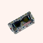 side view zap mood headband with black goggles and blue mirror lenses